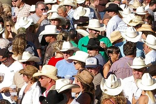 "A sea of white straw cowboy hats..."