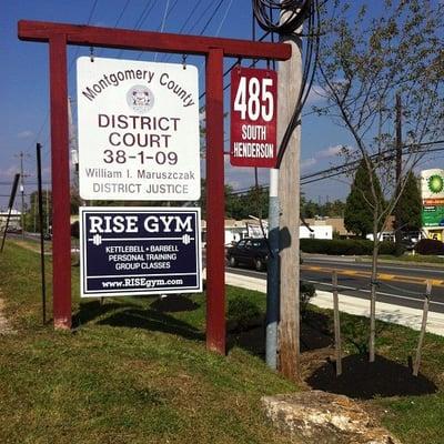 RISE gym street sign