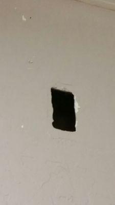 Guard O Matic left holes in wall and did not repair it.