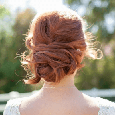 Soft and romantic bridal updo