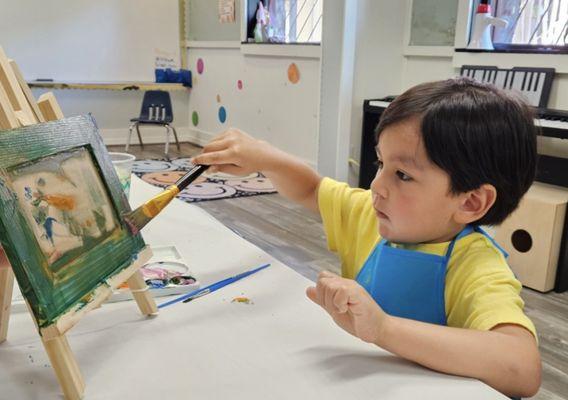 Student Painting their Frame