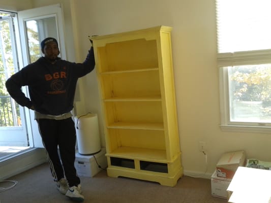 At last, the Customers dear old yellow book shelf stands undamaged in the place of her choosing.
Hoisting a Success !