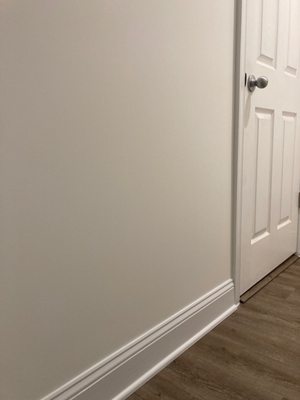 Vinyl planking and repaired wall