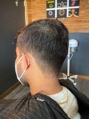 Clipper Fade blended with scissors into the top