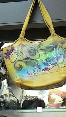 Hand painted by local artist on a hobo bag