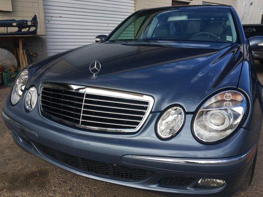 Hood repaired, new bumper, new grill and new headlights on this 06' Benz E350