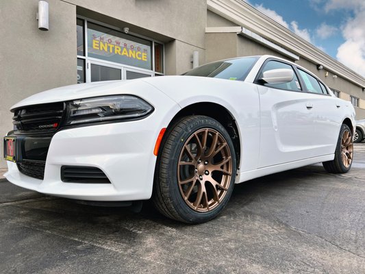 '20 Dodge Charger with Leao Lion Sport Tires and OE Wheels - in copper.