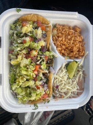 Beef tongue tacos and stake taco with rice and beans.