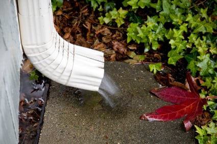 Installation of gutters to correct drainage