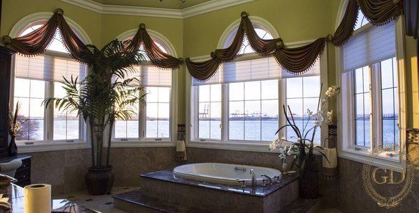 Custom made Arch window draperies with medallions for bathroom.