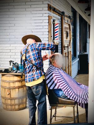 Kevin worked outside since the electric was out and donated free cuts to those impacted by the tornado.