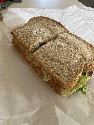 Deli sandwich with sourdough, turkey, Swiss, lettuce, Mayo, tomato