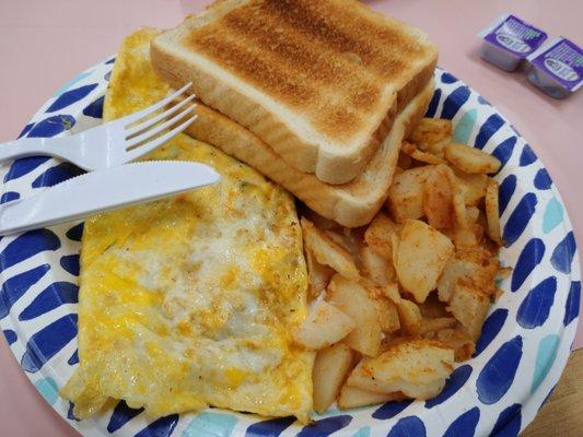 Western omelette with home fries and toast.