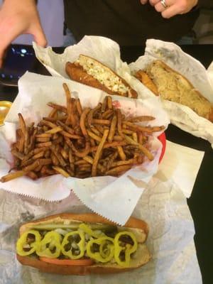 Top: All the Way Dog; Top Left: Ruben Dog; Middle: basket of fresh cut fries; Bottom: Chicago Dog