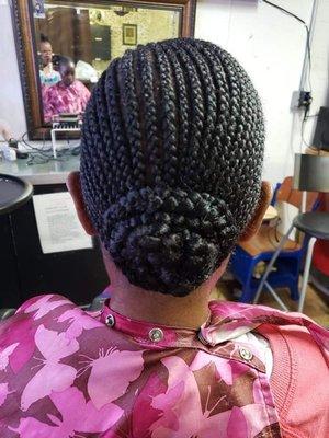 Cornrows into a woman's bun