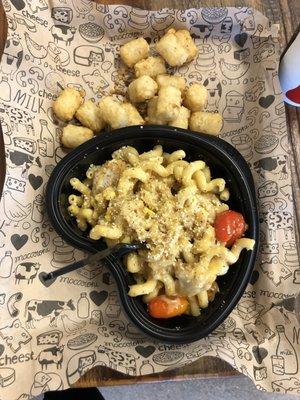 More bland tots, not much flavor to the build your own bowl (sesame ginger dressing, tomatoes, corn, shrooms)