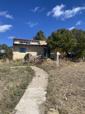 Ojo Sarco: a small mountain village above Truchas on the high road to Taos. This cute 2 BR/1 BA home has a separate studio/workshop. 5 acres