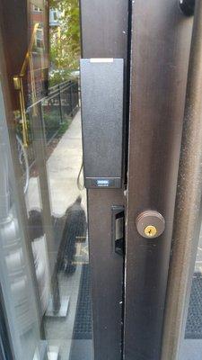 "Secured" door that management claims works properly.  Don't get too attached to your packages because people can easily get to them first.