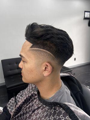 High fade, line on the side, trim on top