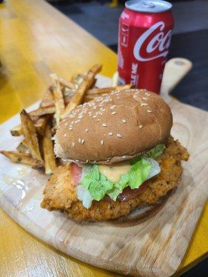 Chicken breast sandwich combo fries and soda $7