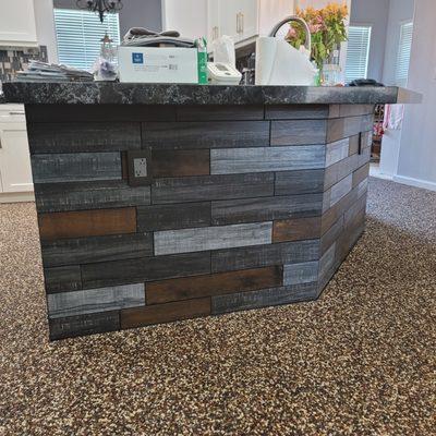 customer wanted to wrap their island with these random wood plank tiles.