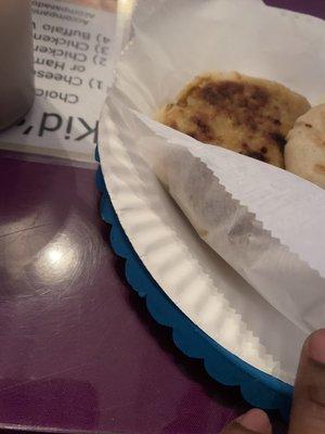 Pupusas served on paper plate