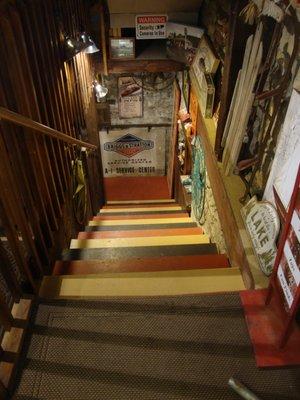 More stuff downstairs, steps leading to the basement.