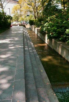 Aquaduct flowing in geometric shapes.