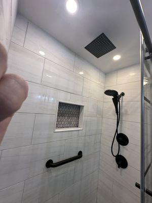 Showing Rain Head and Regular Shower Head.