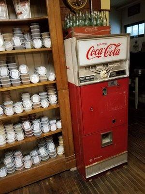 No sorry, the Coke machine is display only