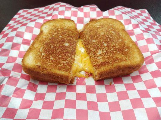 The “cheese freak,” a grilled cheese sandwich featuring over 2 ounces of melted cheese.