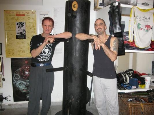 my Sifu and myself at my school with the mook jong