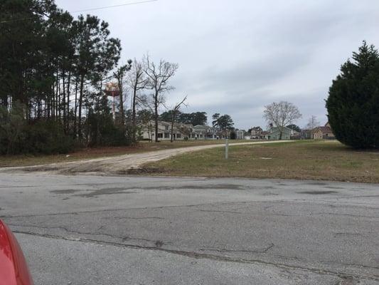 This is the white sand entrance across the street from Ahrens ct. And on Iwo Jima Blvd.