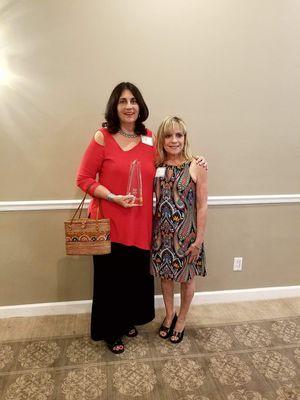 Angie and I receiving our award for new business of the year Sanibel Island!