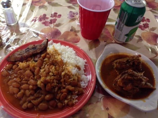 Lunch special with chicken stew served with rice and beans. Delicious!