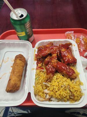 Chicken wing with ketchup and hotsauce and shrimp fried rice. Shrimp egg roll and a Schweppes Gingerale.