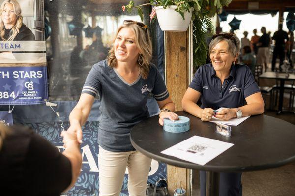 Janelle and Lynda greeting our guests at our launch party.