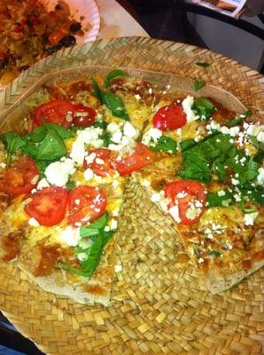 Ethiopian Style Pizza: crusted: teff, millet, quinoa..., sauce: (silsy) a lot of garlic, herbs, spices...fresh: spinach, tomatoe