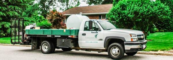 Some people refer to what we do as "lawn spraying". That is one part of the comprehensive lawn care services that we provide.