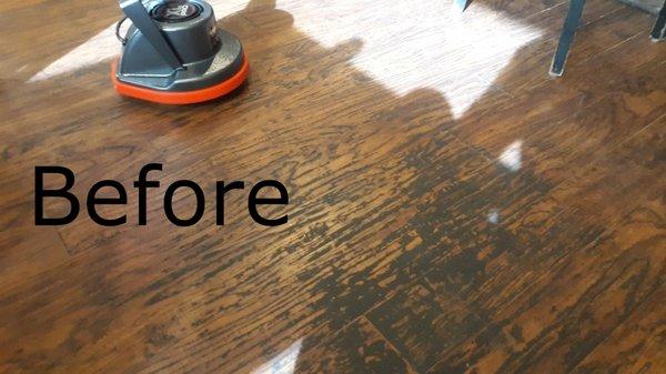 (A) Grease, Dirt, and soap build-up on laminate wood flooring.