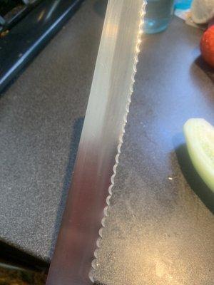 I was horrified to see this angled abrasion put into the knife.