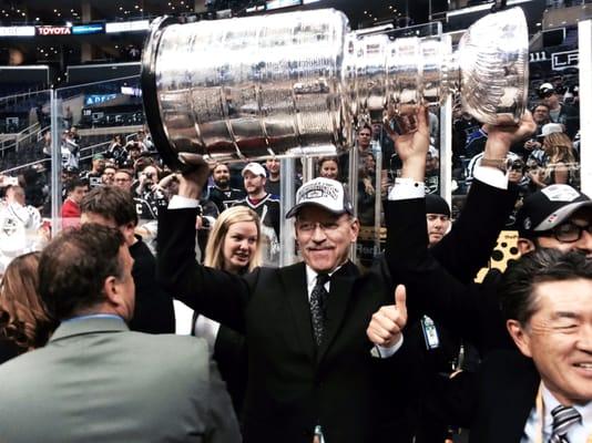 Dr. Ronald Kvitne holding the Stanley Cup after the Los Angeles King's victory. Ronald Kvitne, MD serves as their Team Surgeon.