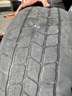 No tread, bald tire