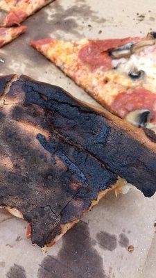 Burnt pizza waited 30 minutes