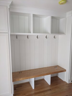 Beautiful mudroom with shiplap wall