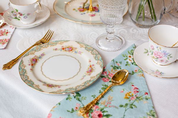 Vintage floral mismatched china for a birthday tea party