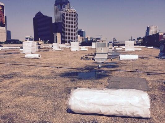 Public Storage- Dallas, getting a new Duralast Roof. Best flat roof on the market. Lowers temperature on roof up to 25%