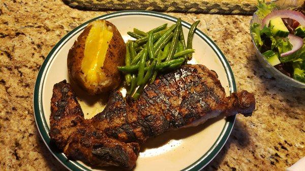 High quality ribeye, green beans PERFECTLY cooked exactly right and a great baked potato from heaven!!!  Best fresh Arugula salad!!