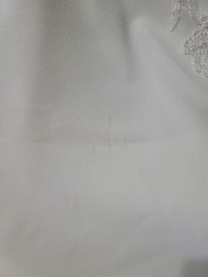 Wedding dress not properly cleaned