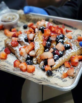 Chicken & French Toast. (Dipped boneless chicken strips, cinnamon texas toast, topped w/ strawberries and blueberries)